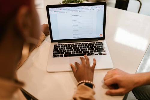Investor completing secure online loan application form